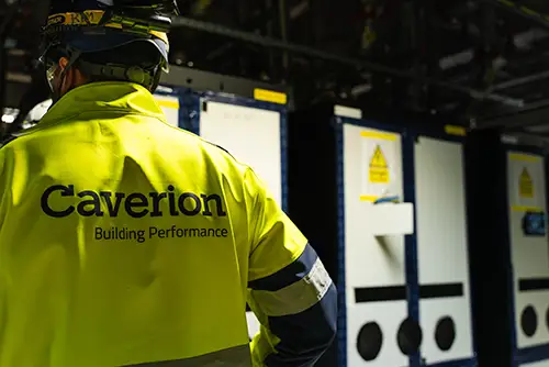 Caverion employee wearing a Caverion jacket